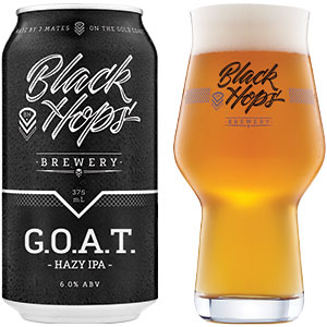 G.O.A.T. Can and glass of beer
